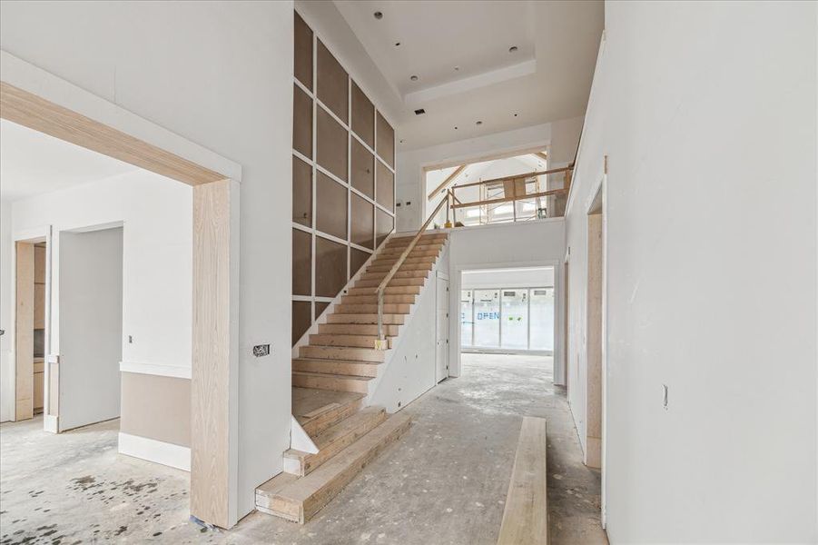 The impressive high ceiling captures you as soon as you enter the front door.