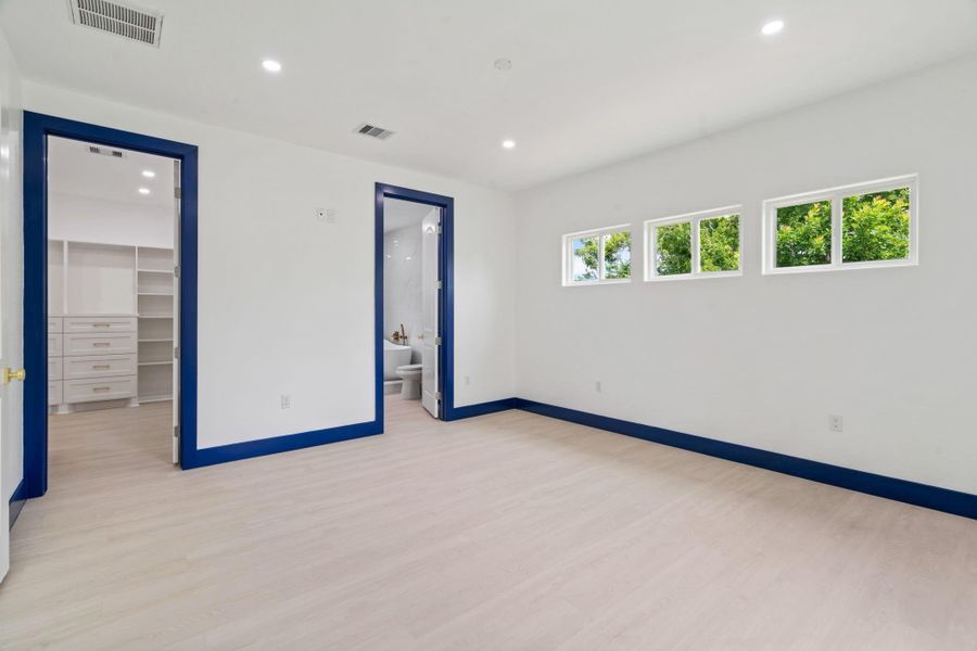 Another view of the primary bedroom