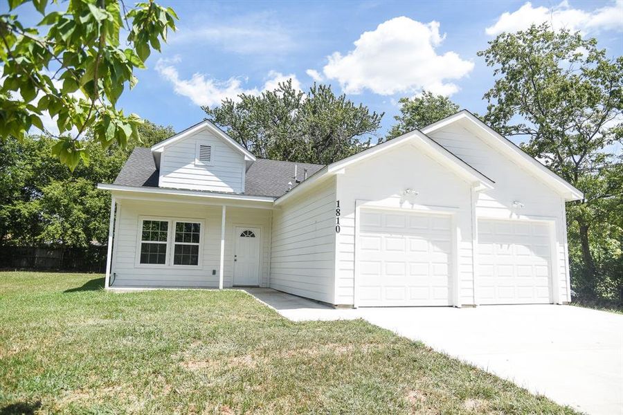 Front exterior of a new home in , Commerce, TX, highlighting curb appeal (Image 1). Front exterior of a new home in , Commerce, TX, highlighting curb appeal (Image 1).