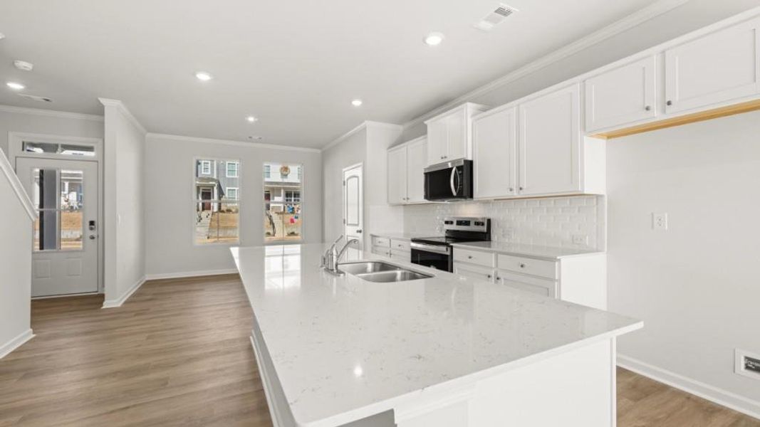 Furnished interior view inside a new home in Waypoint, Flowery Branch (Image 9).
