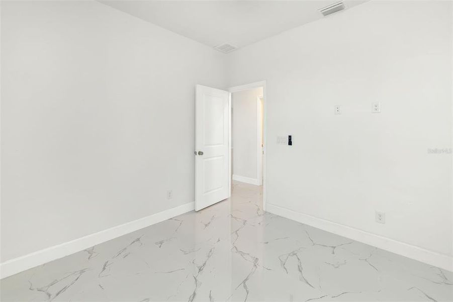 Spacious, unfurnished interior of a new home in , Port Charlotte (Image 35).