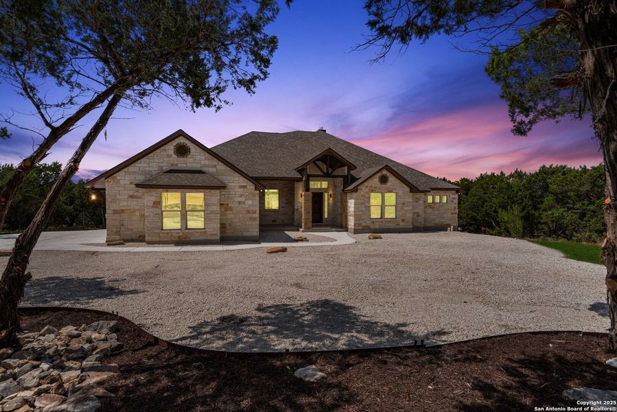 Front exterior of a new home in , New Braunfels, TX, highlighting curb appeal (Image 24). Front exterior of a new home in , New Braunfels, TX, highlighting curb appeal (Image 24).