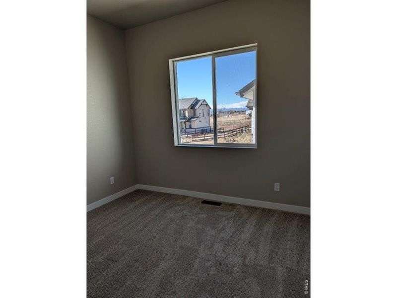 Spacious, unfurnished interior of a new home in Highlands Preserve, Mead (Image 12).
