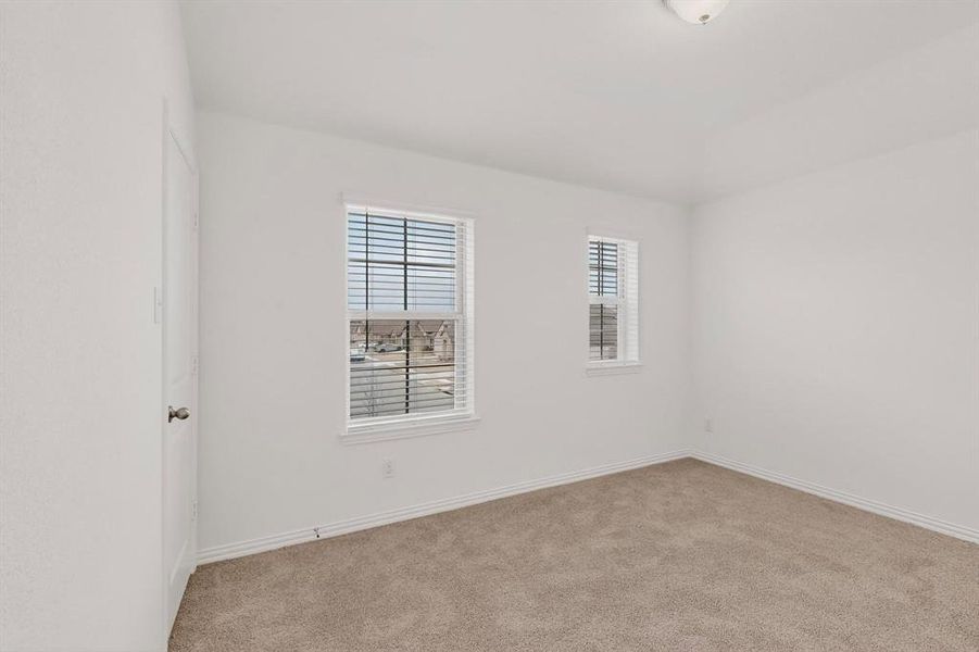 Spacious, unfurnished interior of a new home in Verandah, Royse City (Image 22).