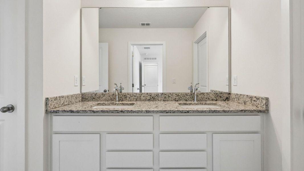Furnished interior view inside a new home in Cyrene at Harmony, St. Cloud (Image 26). Furnished interior view inside a new home in Cyrene at Harmony, St. Cloud (Image 26).