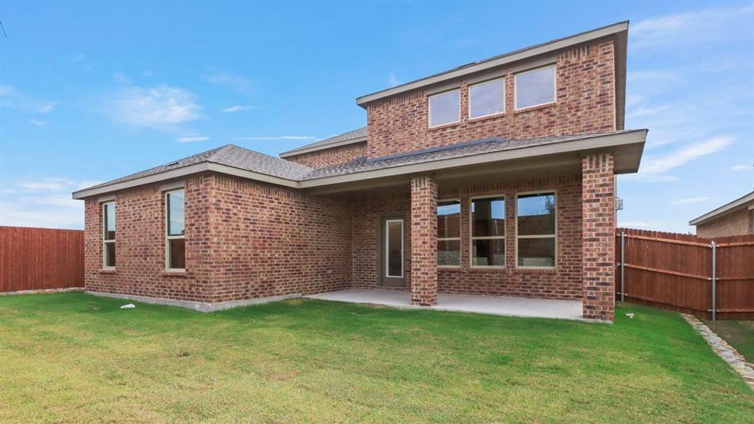 Exterior details and patio area of a home in The Woods at Lindsey Place, Anna (Image 1). Exterior details and patio area of a home in The Woods at Lindsey Place, Anna (Image 1).