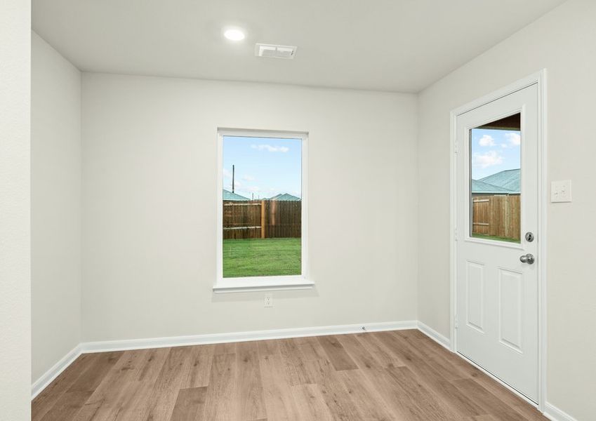 The dining room has large windows that let in great, natural light. The dining room has large windows that let in great, natural light.