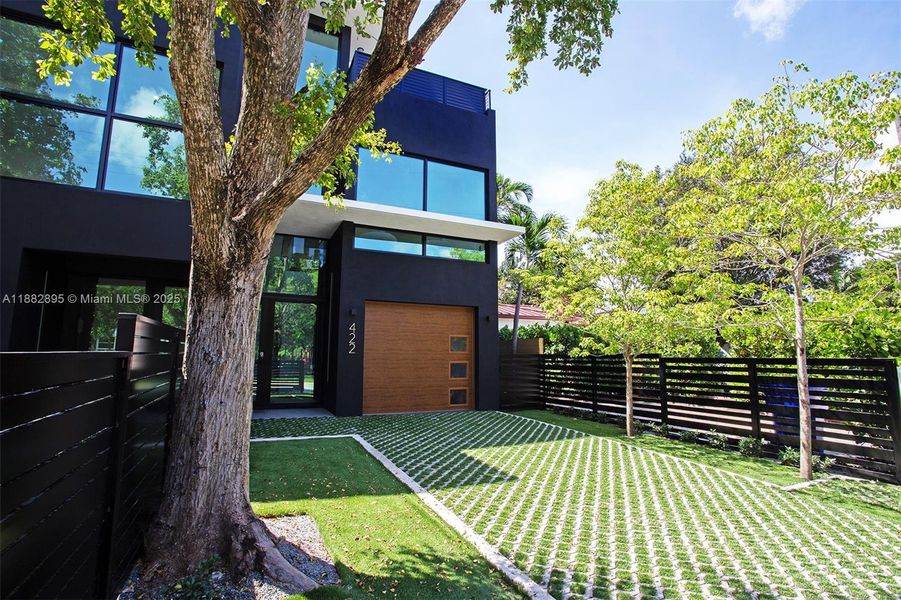 Front exterior of a new home in , Miami, FL, highlighting curb appeal (Image 36).
