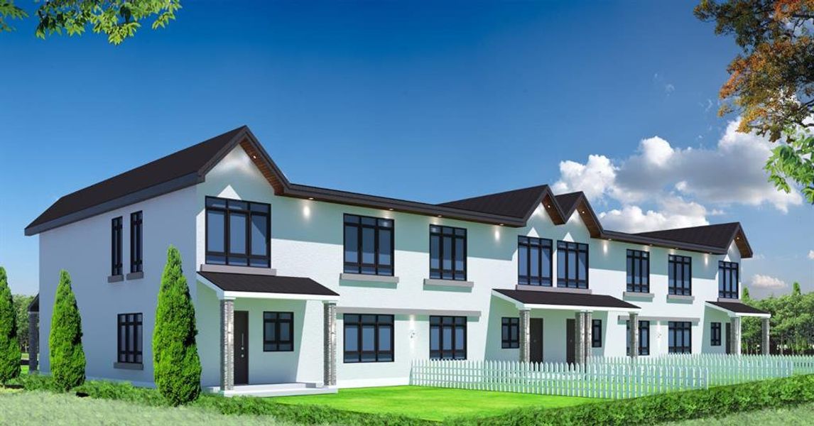 Rear view of property featuring stucco siding