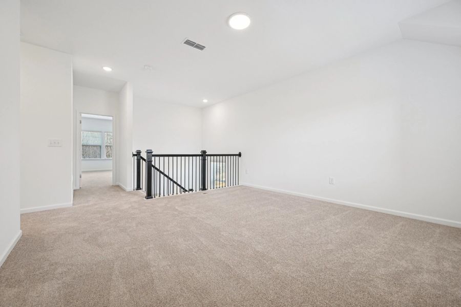 Loft featuring the AW Collection® Roosevelt - Versatile living with designer finishes.