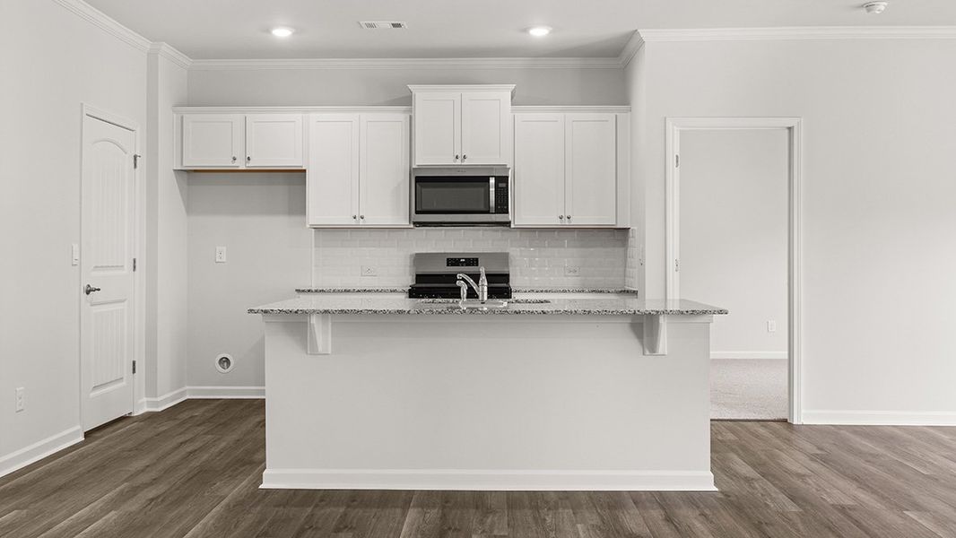 Furnished interior view inside a new home in Oaks at Cedar Grove, Fairburn (Image 6).