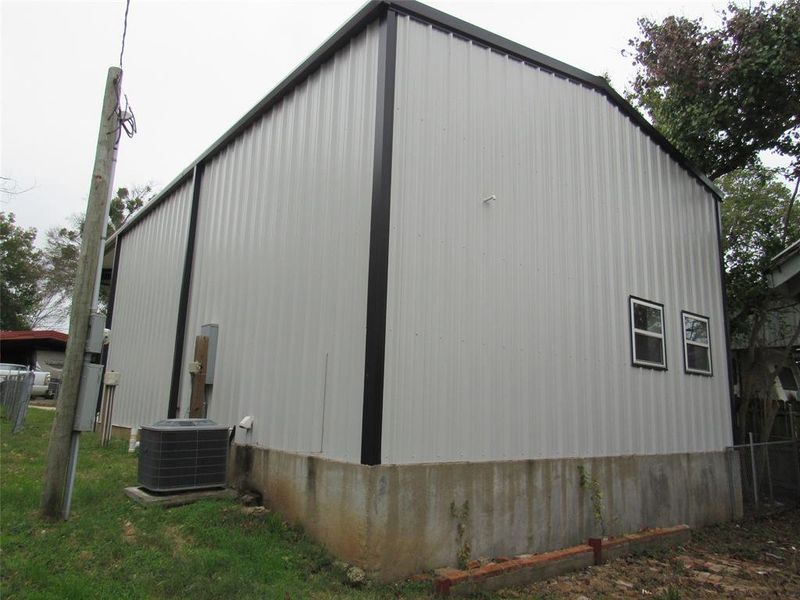 Exterior details and patio area of a home in , Whitney (Image 1). Exterior details and patio area of a home in , Whitney (Image 1).