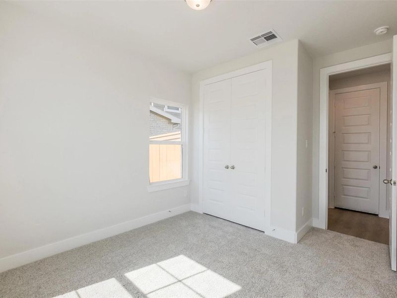 Spacious, unfurnished interior of a new home in Sunterra, Katy (Image 38).