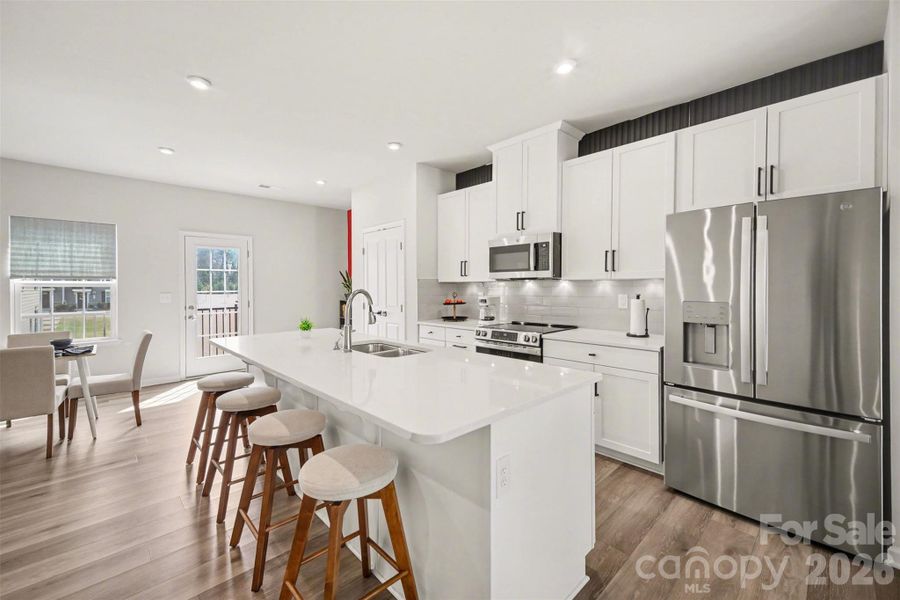 Stainless steel refrigerator with double French doors and bottom freezer drawer