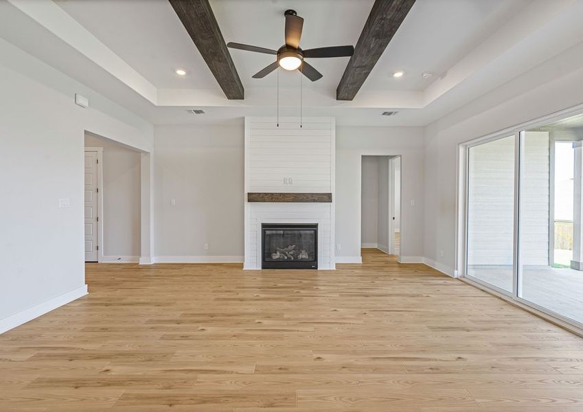 The family room has an electric fireplace.