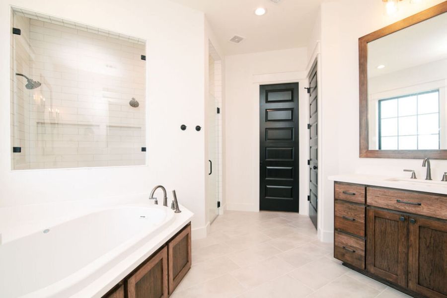 Representative furnished interior of a home built from the The Julia by Reece Homes in Pebble Creek, College Station (Image 46).
