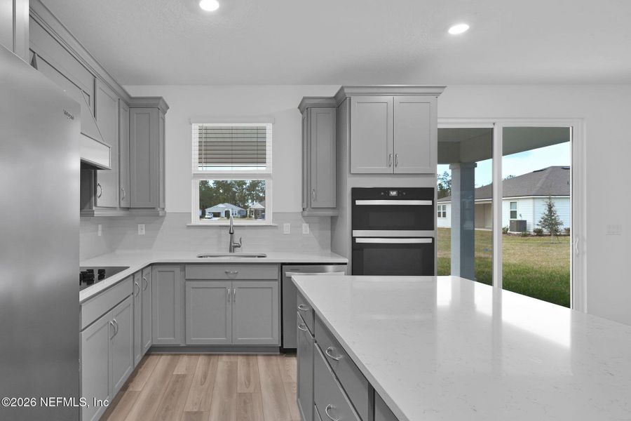 Furnished interior view inside a new home in Hyland Trail, Green Cove Springs (Image 9).