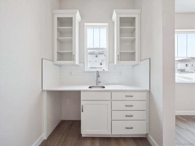Furnished interior view inside a new home in Vista Pines at Crystal Valley, Castle Rock (Image 13).