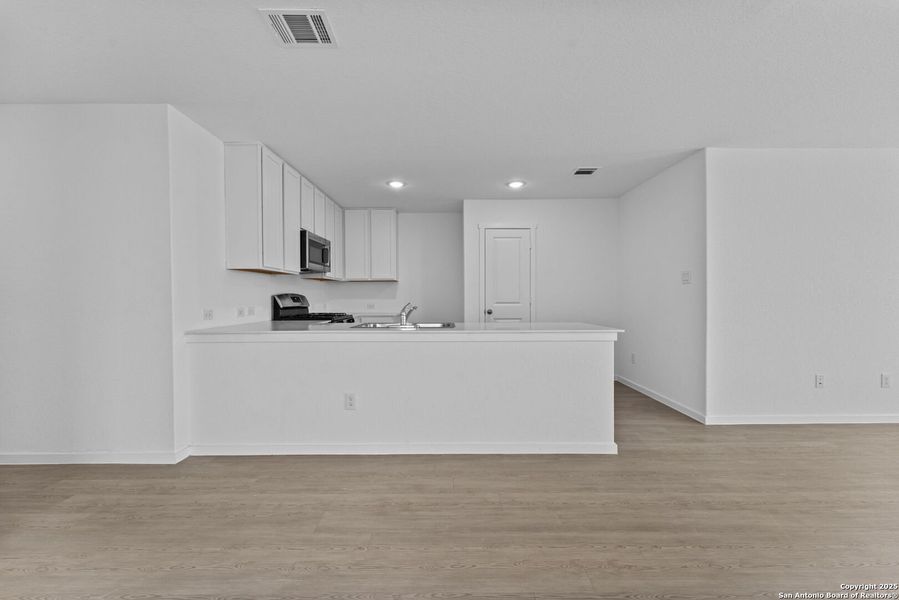 Furnished interior view inside a new home in Lodi Grove, Floresville (Image 3). Furnished interior view inside a new home in Lodi Grove, Floresville (Image 3).