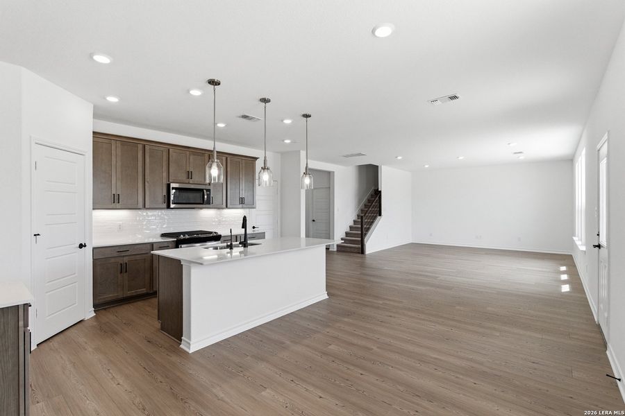 Furnished interior view inside a new home in Nopal Valley, San Antonio (Image 14).