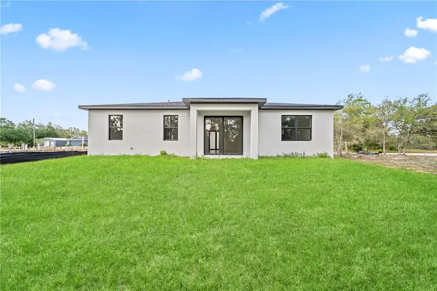Exterior details and patio area of a home in , Lehigh Acres (Image 4).