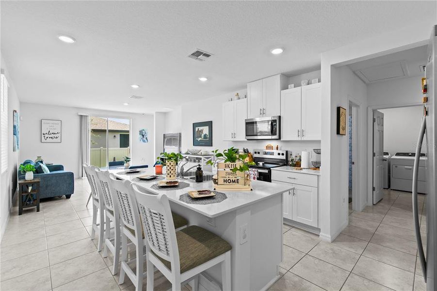 Furnished interior view inside a new home in , Winter Haven (Image 16). Furnished interior view inside a new home in , Winter Haven (Image 16).