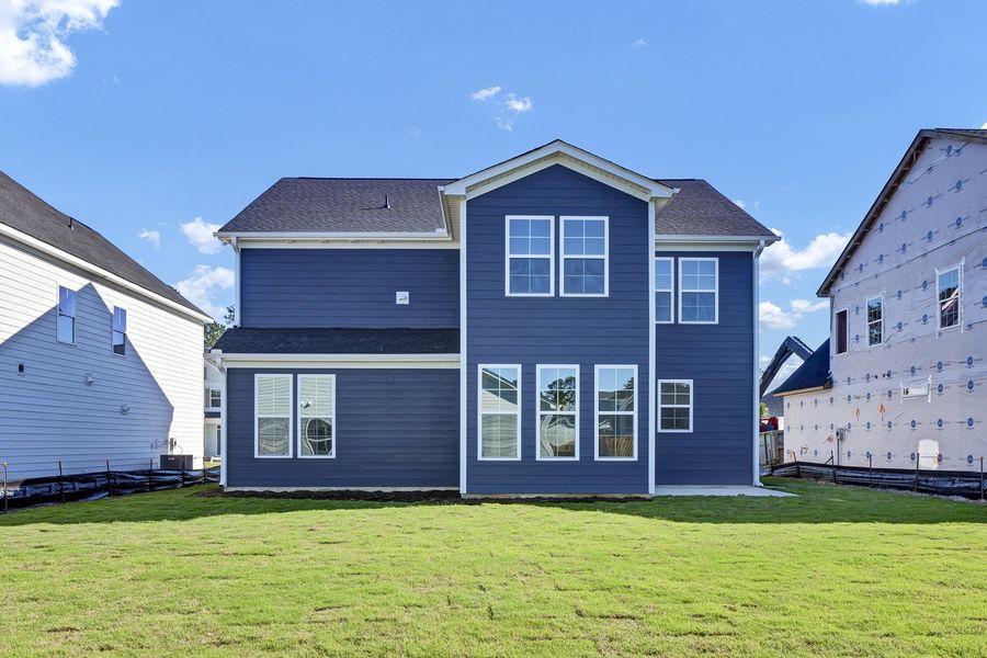 Exterior details and patio area of a home in Grand Park, Leland (Image 18).