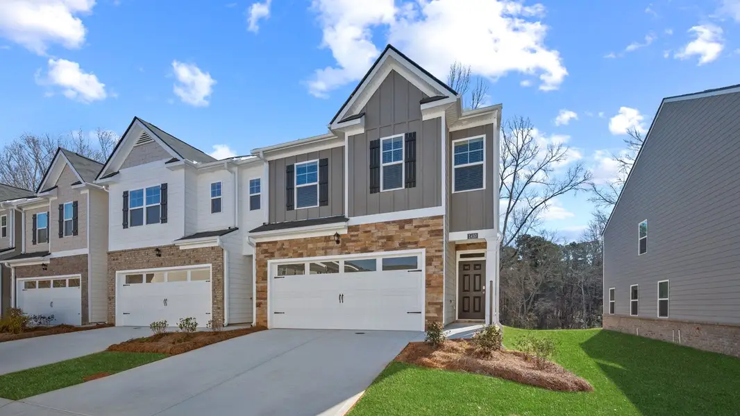 Front exterior of a new home in Echo Glen, Stockbridge, GA, highlighting curb appeal (Image 2).