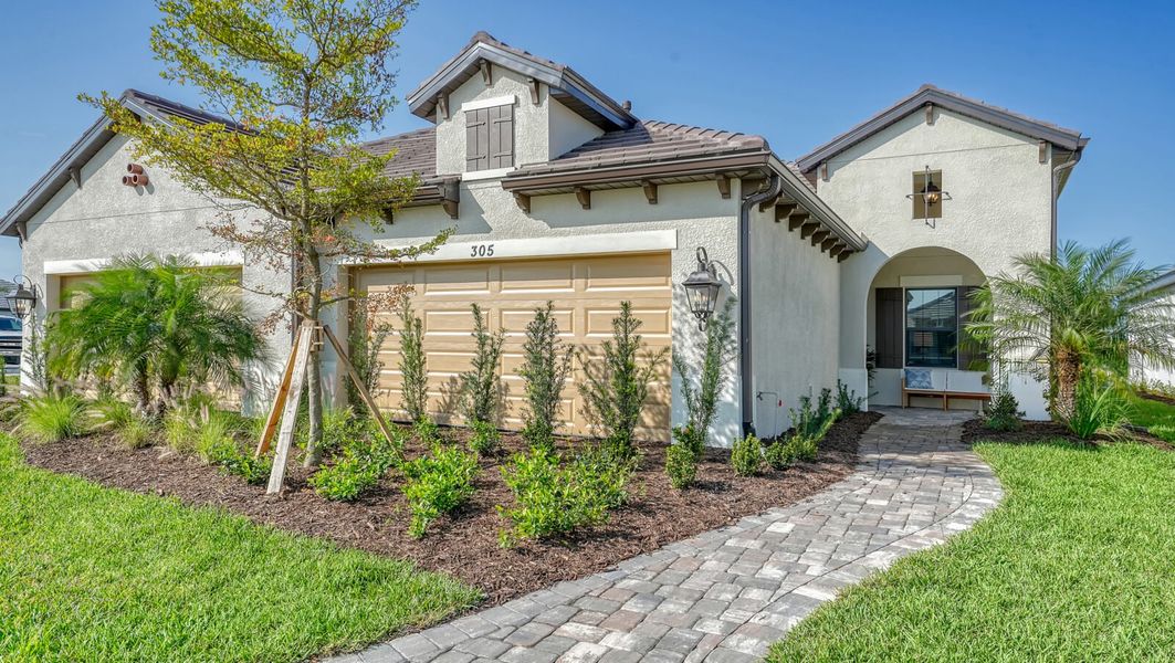 Representative exterior photo of a completed home built from the Tidewinds 2 by Neal Communities in Vistera of Venice, Venice, FL (Image 2).