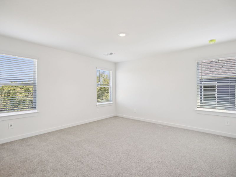 The primary suite offers a private retreat.