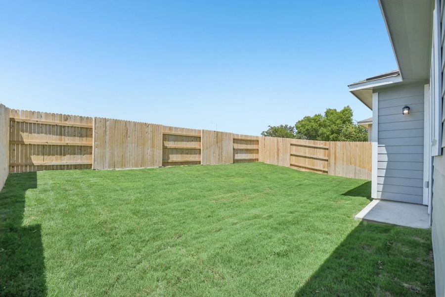 Exterior details and patio area of a home in Edgebrooke, Pflugerville (Image 3).