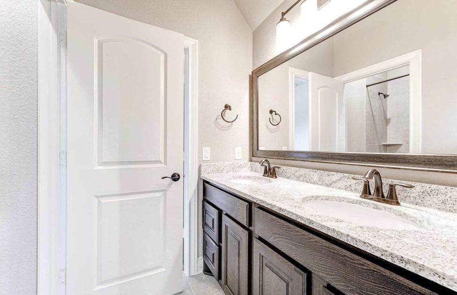 Representative furnished interior of a home built from the 4590 by Ravenna Homes in Artavia 70′, Conroe (Image 8).