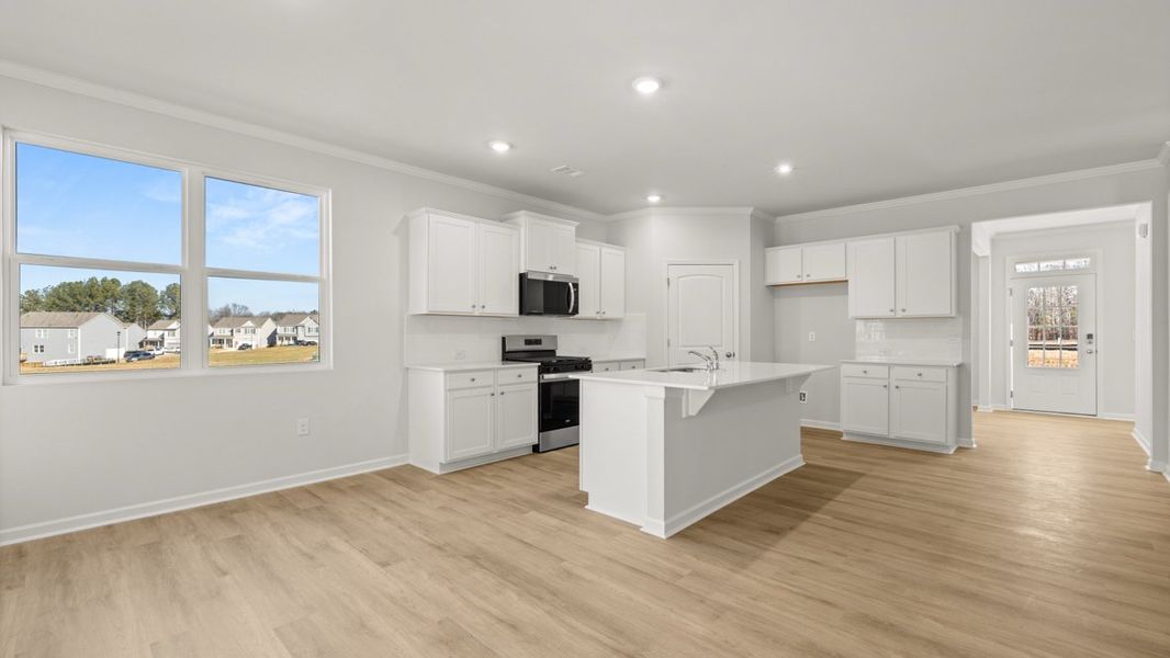 Representative furnished interior of a home built from the Fayette ll by D.R. Horton in Braselton Village, Braselton (Image 6).