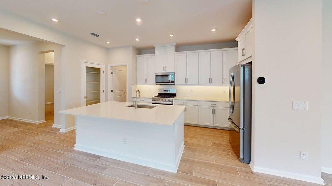 Furnished interior view inside a new home in RiverTown - WaterSong, St. Johns (Image 13). Furnished interior view inside a new home in RiverTown - WaterSong, St. Johns (Image 13).