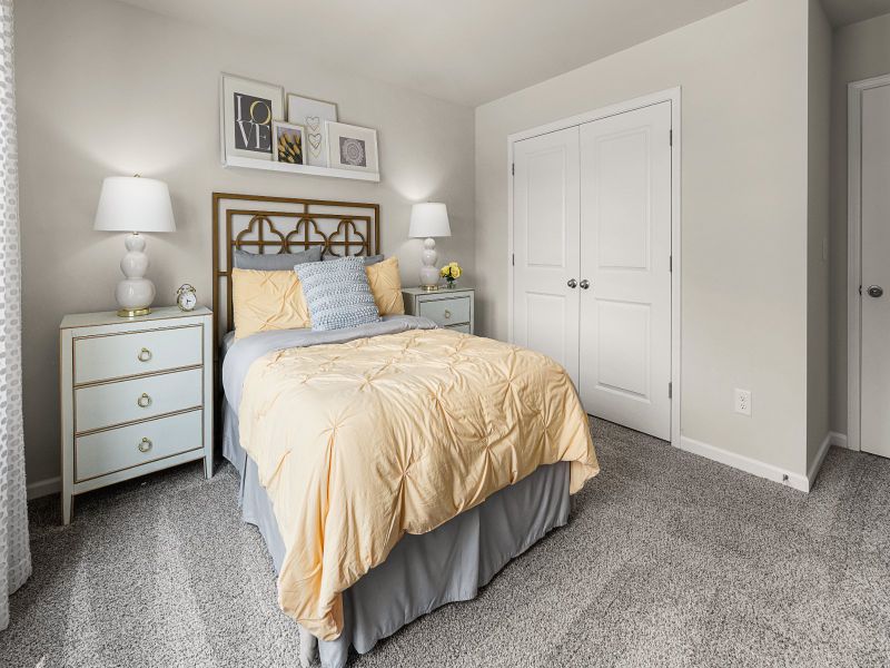 Secondary bedroom in the Taylorsville floorplan at a Meritage Homes community in Wendell, NC.