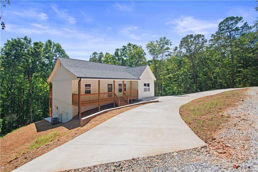 Front exterior of a new home in , Dawsonville, GA, highlighting curb appeal (Image 1). Front exterior of a new home in , Dawsonville, GA, highlighting curb appeal (Image 1).