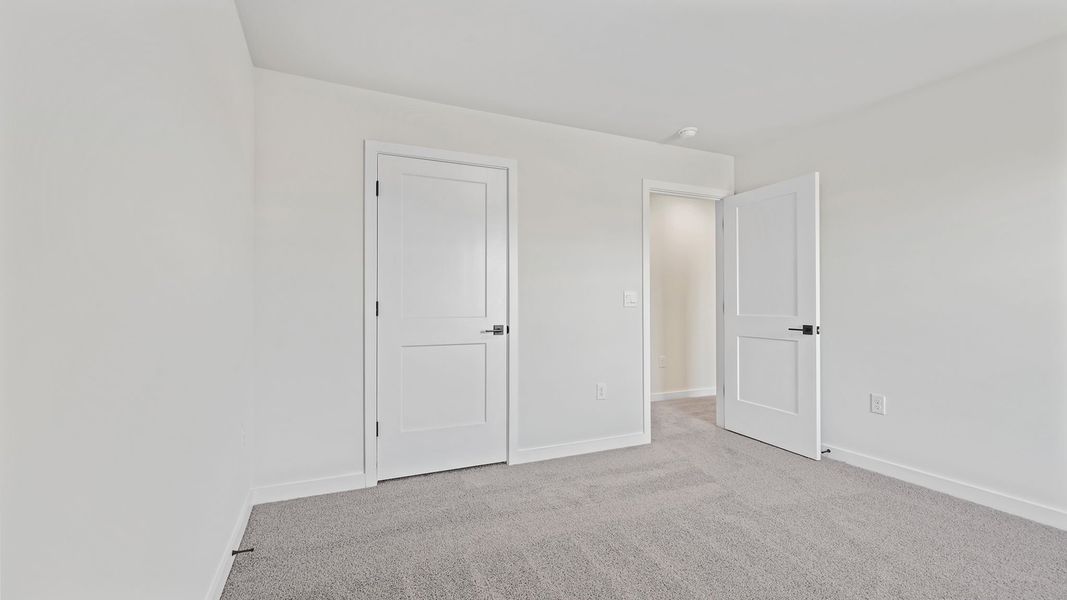 Spacious, unfurnished interior of a new home in Adams Glen, Greenville (Image 27).