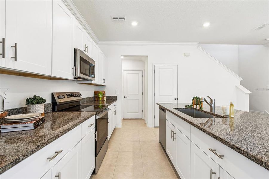 Furnished interior view inside a new home in , Tampa (Image 5). Furnished interior view inside a new home in , Tampa (Image 5).