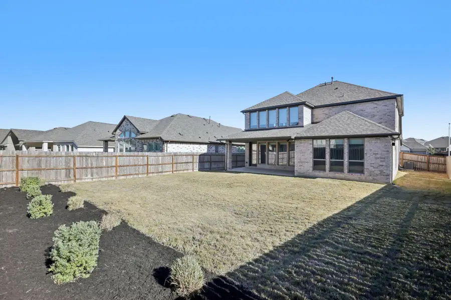 Exterior details and patio area of a home in , Leander (Image 4).