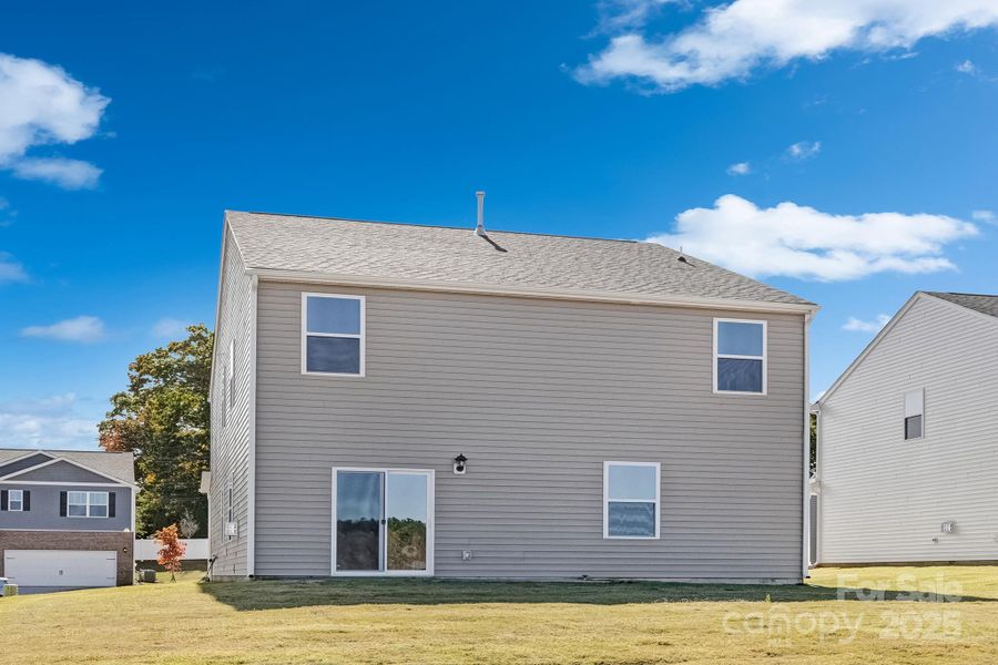 Exterior details and patio area of a home in Silverstein, Salisbury (Image 4).