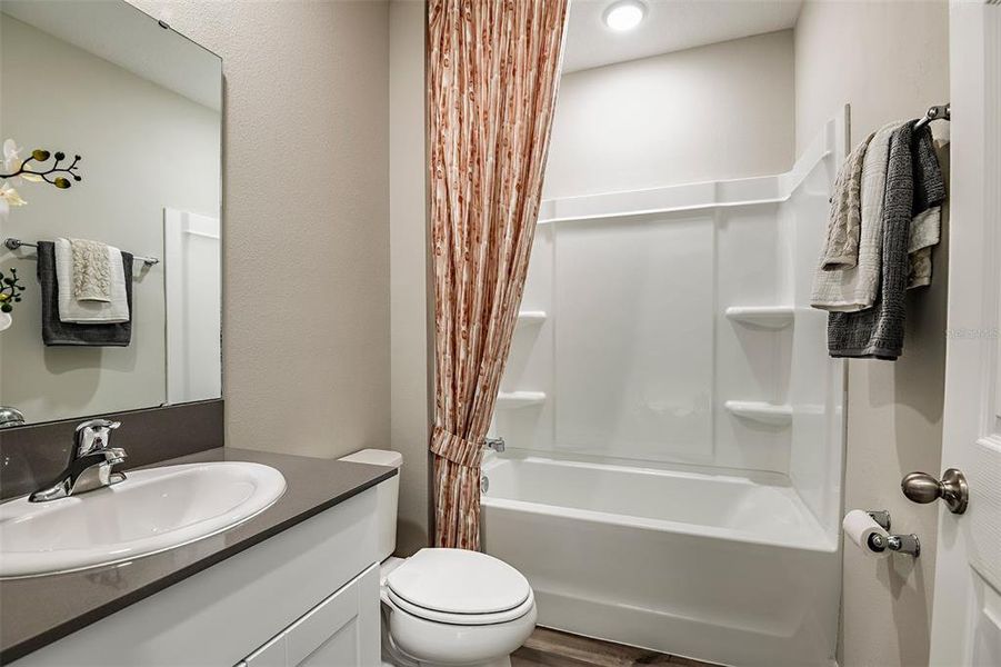 Furnished interior view inside a new home in Pasadena Landing, Wesley Chapel (Image 20).