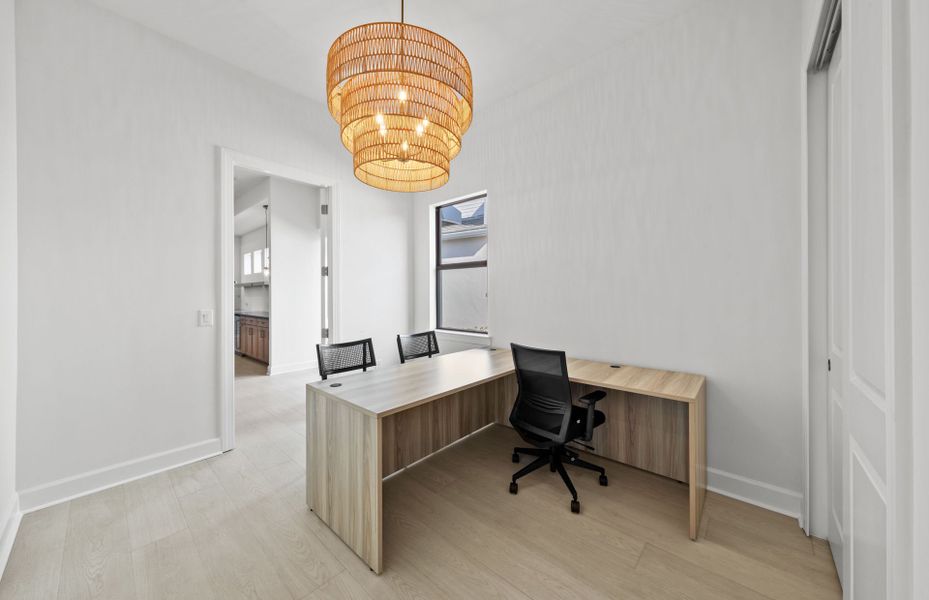 Secondary bedroom, shown as our Design Center office Secondary bedroom, shown as our Design Center office