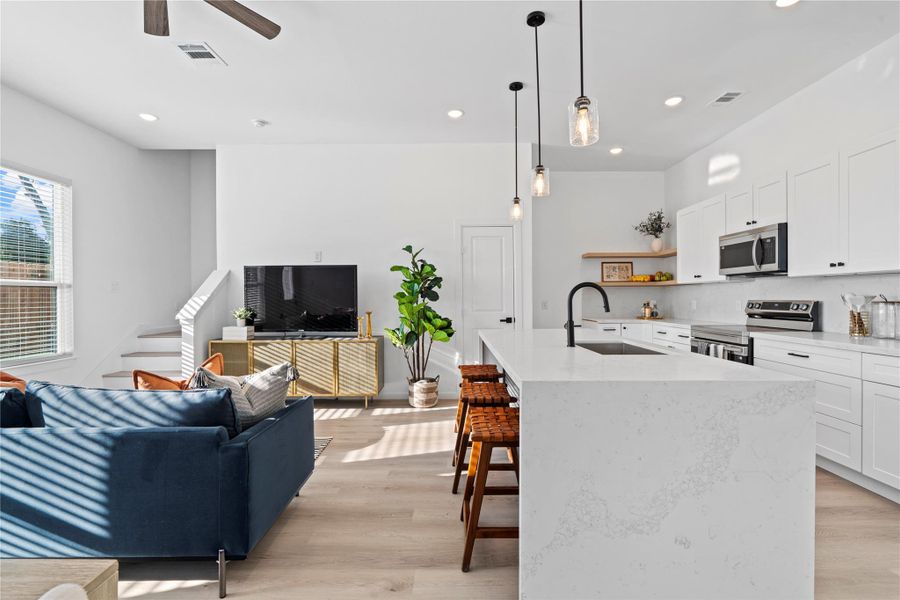 Wrap-around kitchen gives you a continuous counter run and extra storage instead of wasted space. Wrap-around kitchen gives you a continuous counter run and extra storage instead of wasted space.