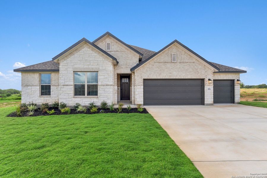 Front exterior of a new home in Preserve at Annabelle Ranch, San Antonio, TX, highlighting curb appeal (Image 1).