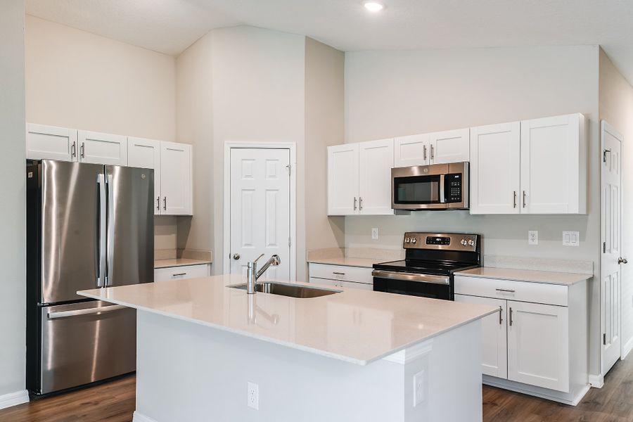 Furnished interior view inside a new home in Scenic Terrace, Haines City (Image 8).