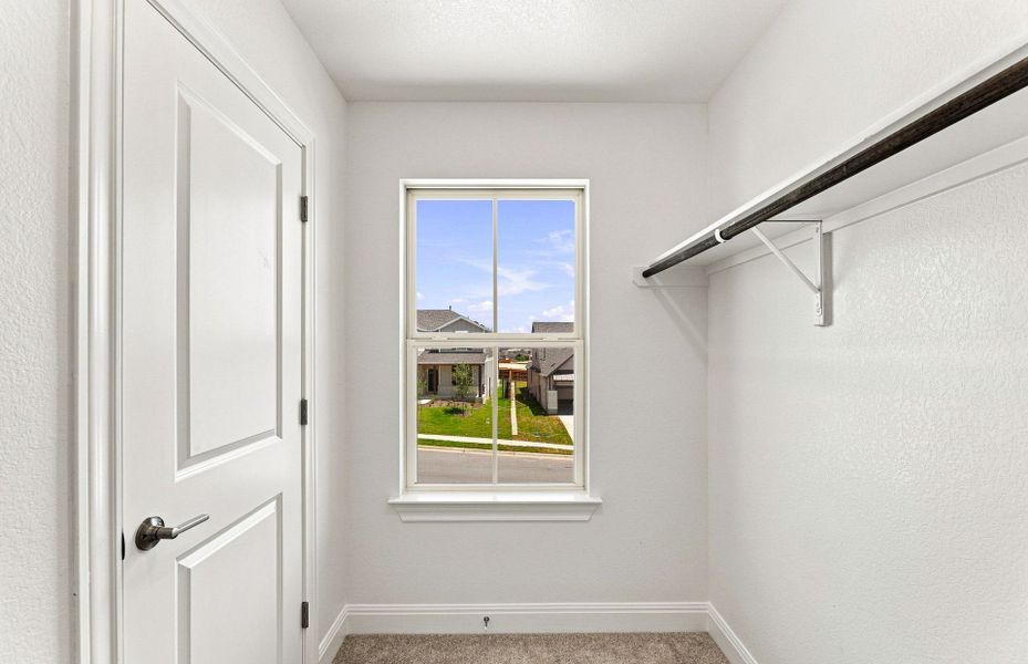 Spacious, unfurnished interior of a new home in Saddleback at Santa Rita Ranch, Liberty Hill (Image 39).