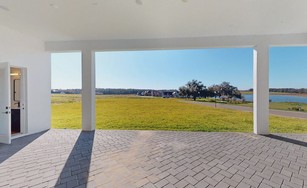 Exterior details and patio area of a home in West Hill Estates, Dade City (Image 21).