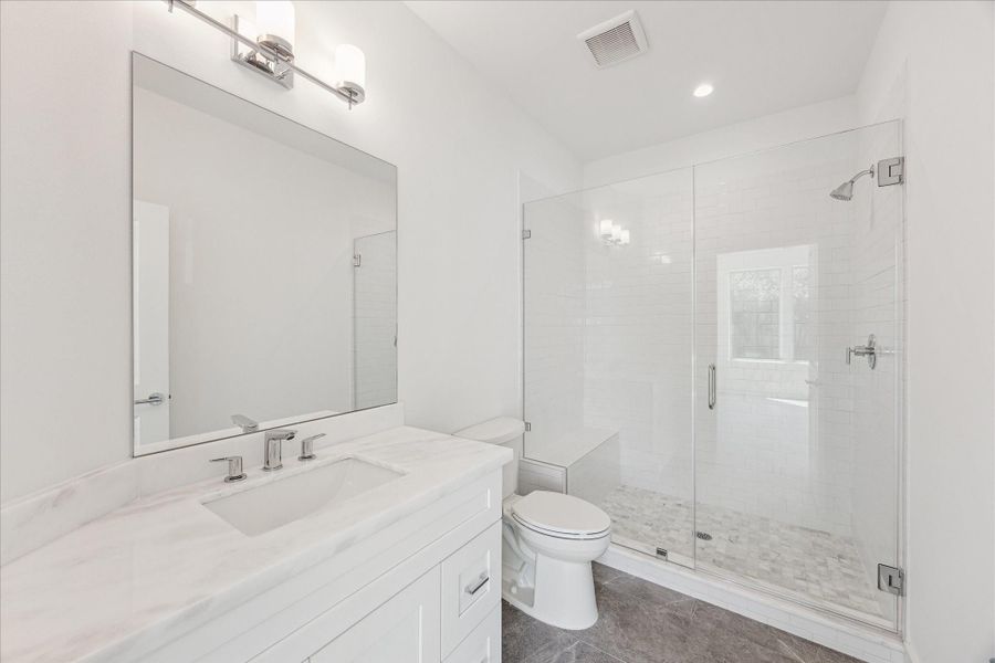 En-Suite Bathroom * HUGE Walk In Shower with Subway Tile and Marble * Porcelain Floor. En-Suite Bathroom * HUGE Walk In Shower with Subway Tile and Marble * Porcelain Floor.