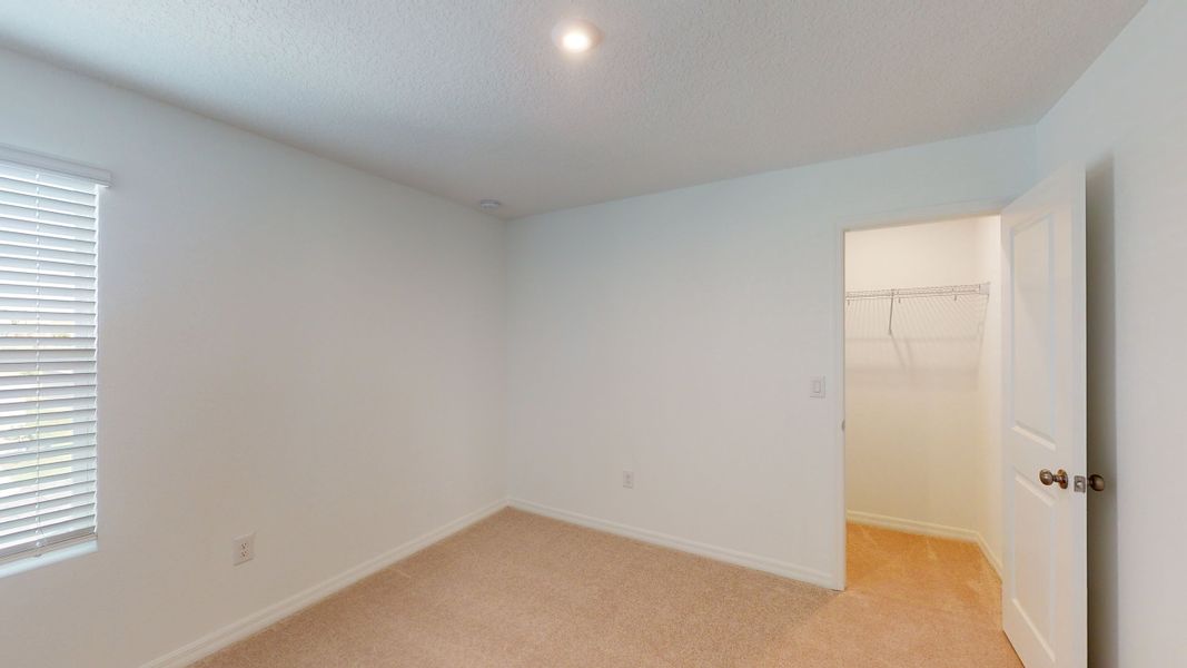 Representative unfurnished interior of a home built from the Azalea by Taylor Morrison in Riverfront, Edgewater (Image 14).