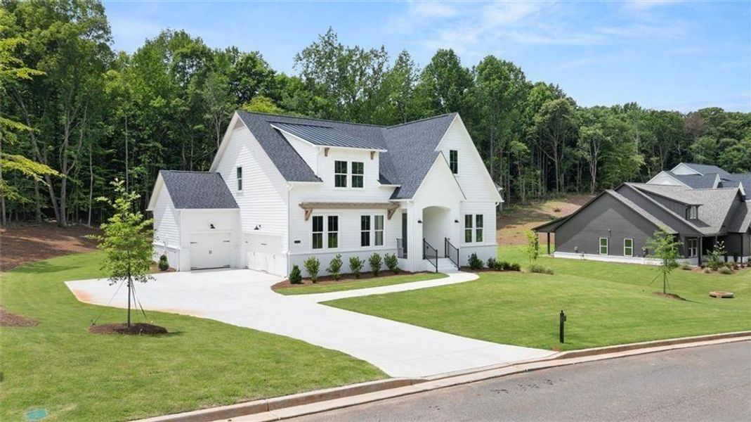 Front exterior of a new home in , Gainesville, GA, highlighting curb appeal (Image 25). Front exterior of a new home in , Gainesville, GA, highlighting curb appeal (Image 25).